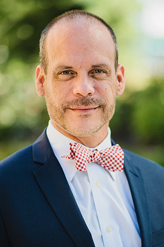 Interim Dean Philip Osteen smiles at the camera